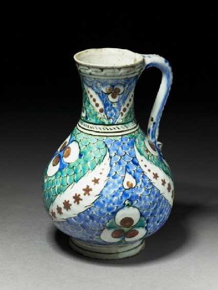 Jug with leaves and çintamani motif against a fish-scale backgroundoblique