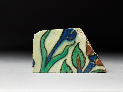 Tile fragment with stems and leavestop