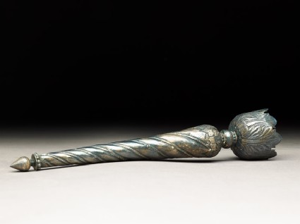 Handle of a chowry, or fly-whisk, with spirals and leavesside