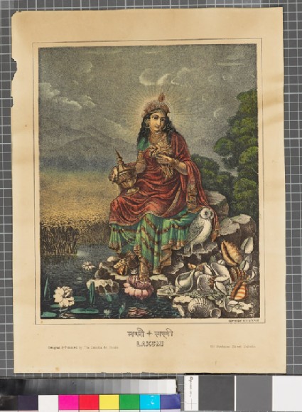 Lakshmi seated by a pool with an owlfront