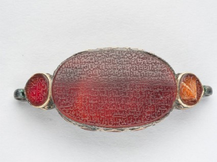 Bracelet setting with 14 oval bezel amulets and inscriptionfront