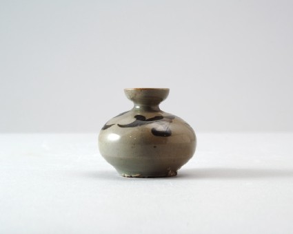 Greenware oil bottle with scroll decorationfront