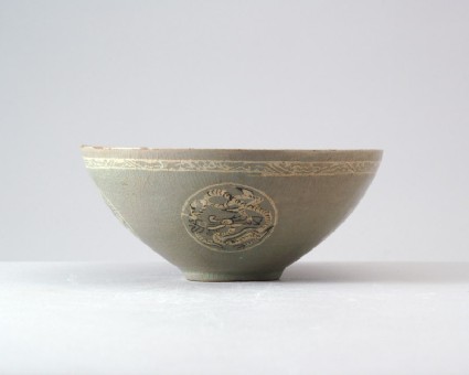 Greenware bowl with dragons and a flowerfront