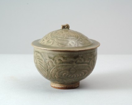 Greenware bowl and lid with floral decorationfront