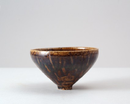 Black ware bowl with russet iron splashesfront