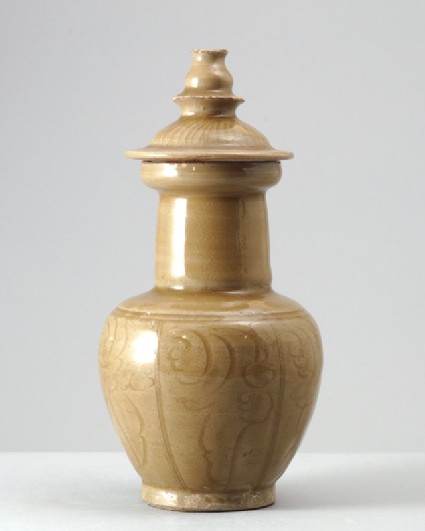 Greenware funerary vase with floral decorationfront