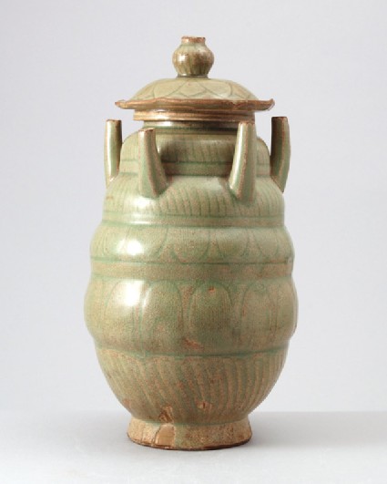 Greenware funerary jar with five spoutsfront