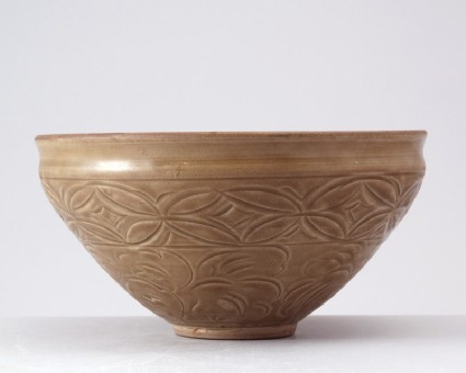 Greenware bowl with waves and floral decorationfront