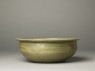 Greenware basin with small kneeling figure (side)
