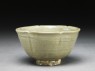 Greenware bowl with lobed rim and sides (oblique)