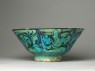 Bowl with animals against a foliate background (side)
