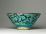 Bowl with animals against a foliate background (side)