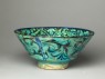 Bowl with animals against a foliate background (oblique)