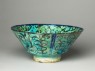 Bowl with animals against a foliate background (oblique)