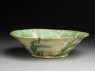 Bowl with splashed decoration in green and brown (oblique)