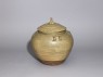 Greenware jar and cover with two birds (oblique)