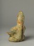 Greenware burial figure of man playing a harp (side)