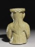 Greenware burial vessel section in the form of man holding a goat (back)