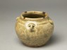 Greenware jar with chicken head and tail (oblique)