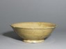 Greenware bowl with foliated rim (oblique)