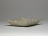 White ware dish with lotus flowers (side)