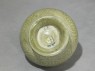 Globular greenware jar with lotus flower decoration (bottom)