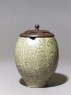 Greenware jar with floral decoration and modern lid (side)