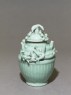 Greenware funerary jar with dragon (oblique)