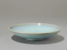 Shallow dish with blue glaze (oblique)