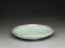 Shallow dish with blue glaze (oblique)