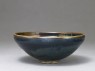 Black ware bowl with brown stripes (oblique)