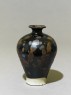 Black ware vase with 'partridge feather' glazes (oblique)