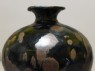 Black ware vase with 'partridge feather' glazes (detail, uppper part)