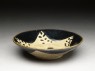 Black ware bowl with star (oblique)