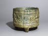 Three-legged basin, or lian, with tigers and mountains in relief (oblique)