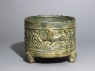 Three-legged basin, or lian, with tigers and mountains in relief (oblique)