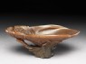 Rhinoceros horn libation cup in the form of a lotus (oblique)