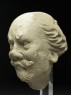 Stucco head of a man (side)