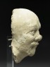 Stucco head of a man (side)