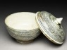 Covered bowl with feather-floral designs (oblique, with lid open)