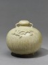 Greenware jar with dragons in relief (oblique)