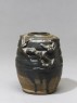 Dark brown glazed dragon jar (oblique)