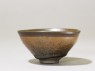 Black ware tea bowl with 'hare's fur' glaze (side)