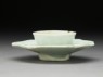 White ware cup stand with petals (oblique)