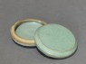Circular greenware box with lotus flowers (oblique, open)