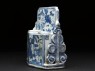 Blue-and-white brush stand with three figures (side)