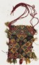 Quilted bag with rosettes, stars, and quatrefoils, probably an amulet-bag (back)