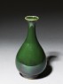 Pear-shaped bottle with a green 'flambé' glaze (oblique)