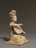 Figure of a mandolin player (oblique)