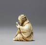 Netsuke in the form of a Nō actor wearing a mask (side)